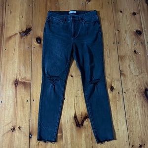Light Gray Madewell mid rise skinny ripped jeans